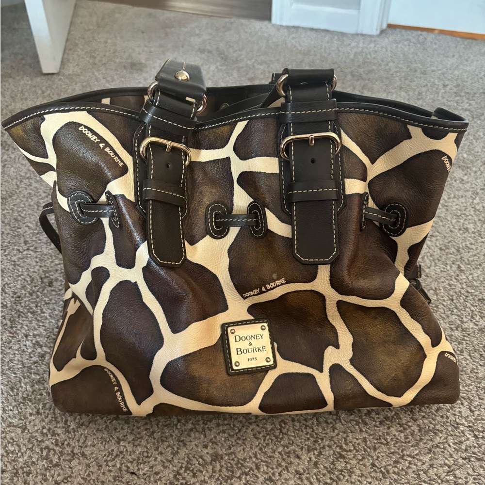 Dooney & Bourke brown and cream giraffe bag.